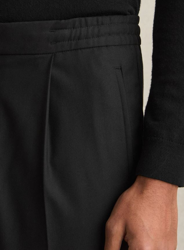 Relaxed-Fit Pleated Tapered Trousers