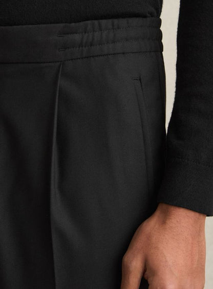 Relaxed-Fit Pleated Tapered Trousers