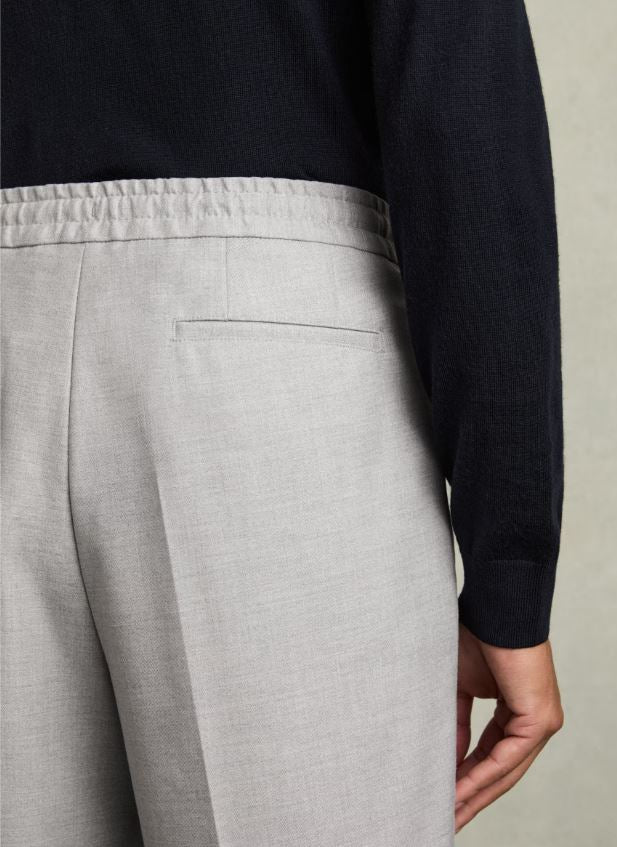 Relaxed-Fit Pleated Tapered Trousers