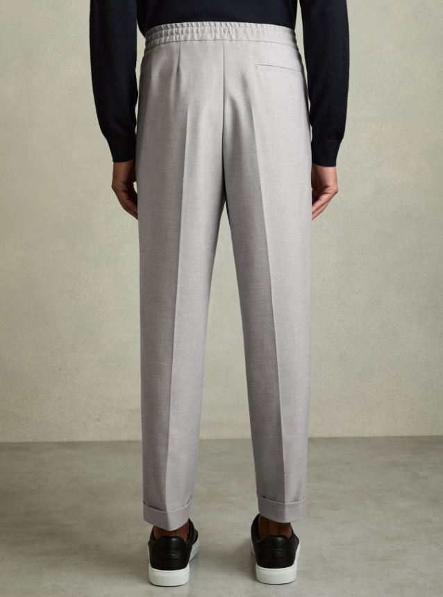 Relaxed-Fit Pleated Tapered Trousers